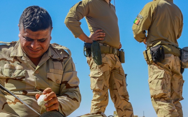 Iraqi Security Forces Breach Training