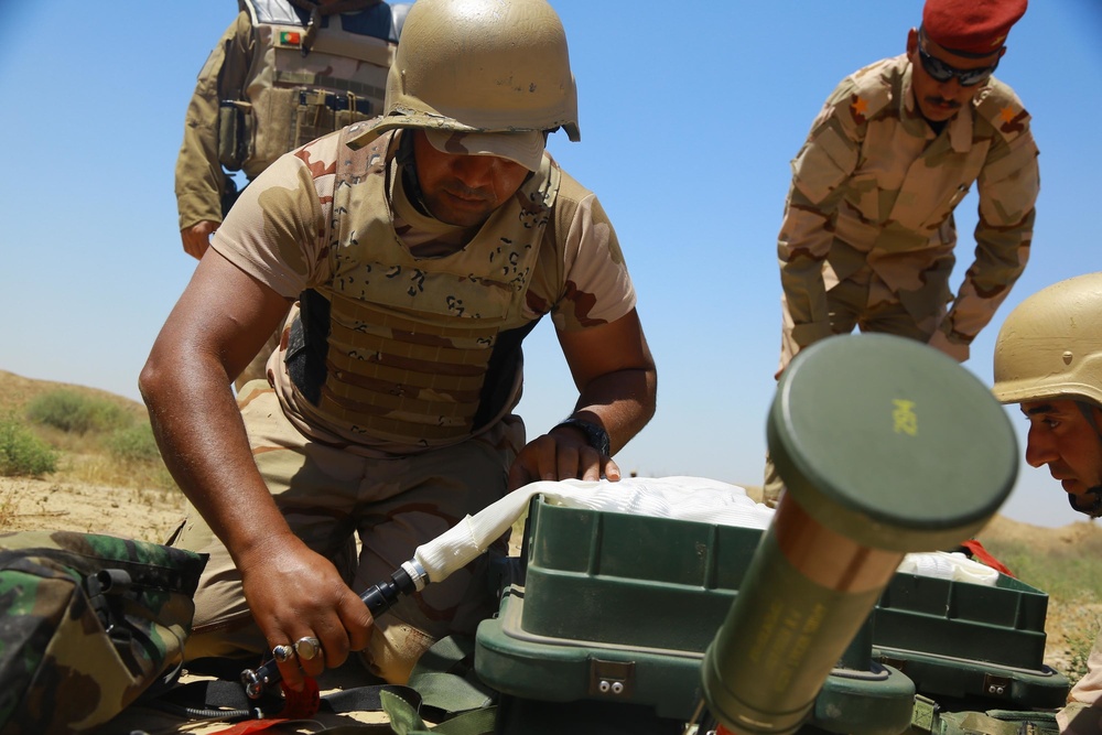 Iraqi Security Forces Breach Training