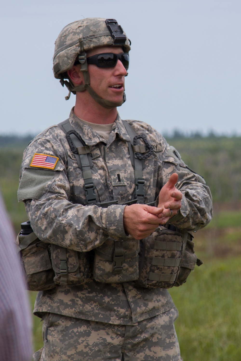 Soldier Speaks with Distinguished Visitors