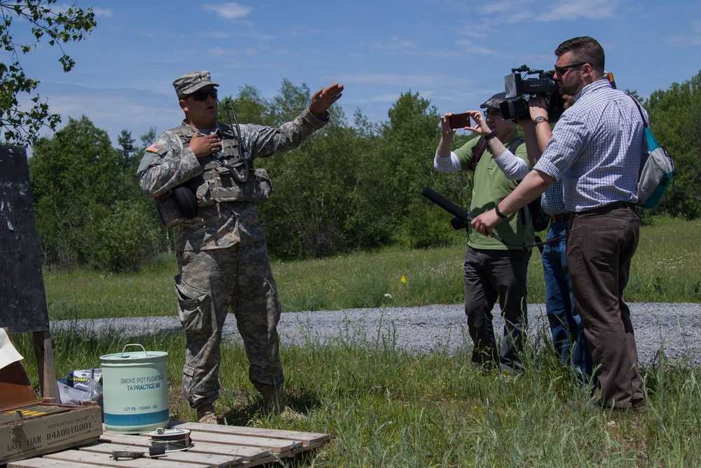 Soldier Speaks with Distinguished Visitors