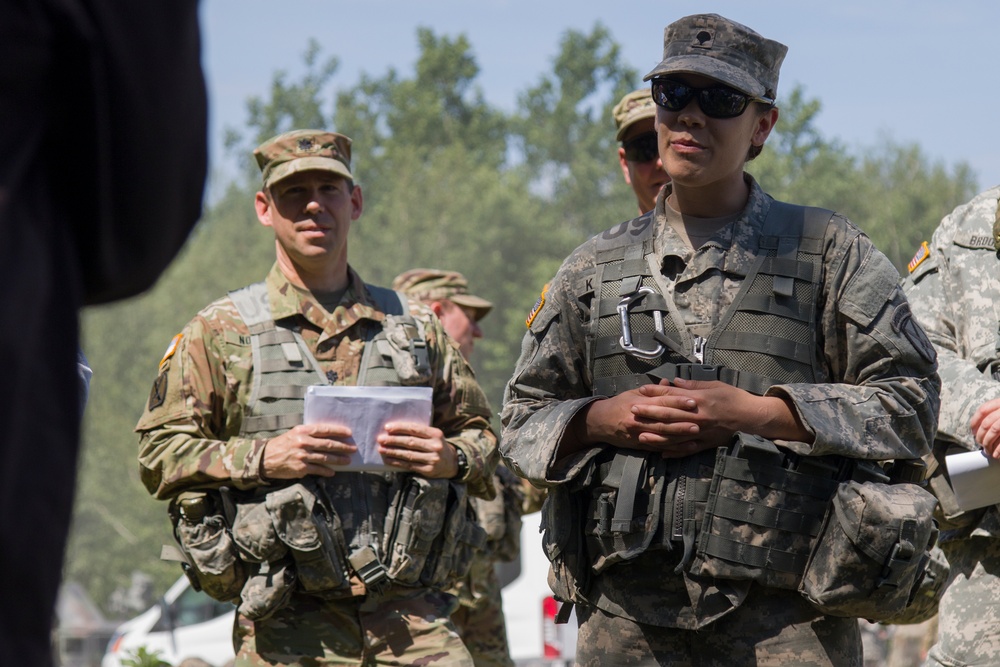 Soldier Speaks with Distinguished Visitors