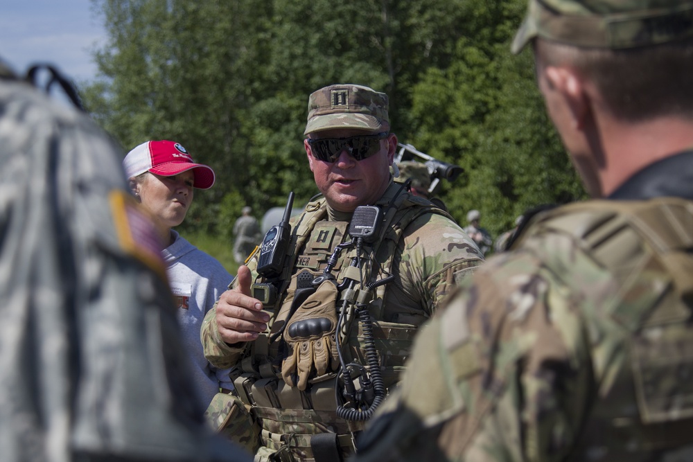 Soldier Speaks with Distinguished Visitors