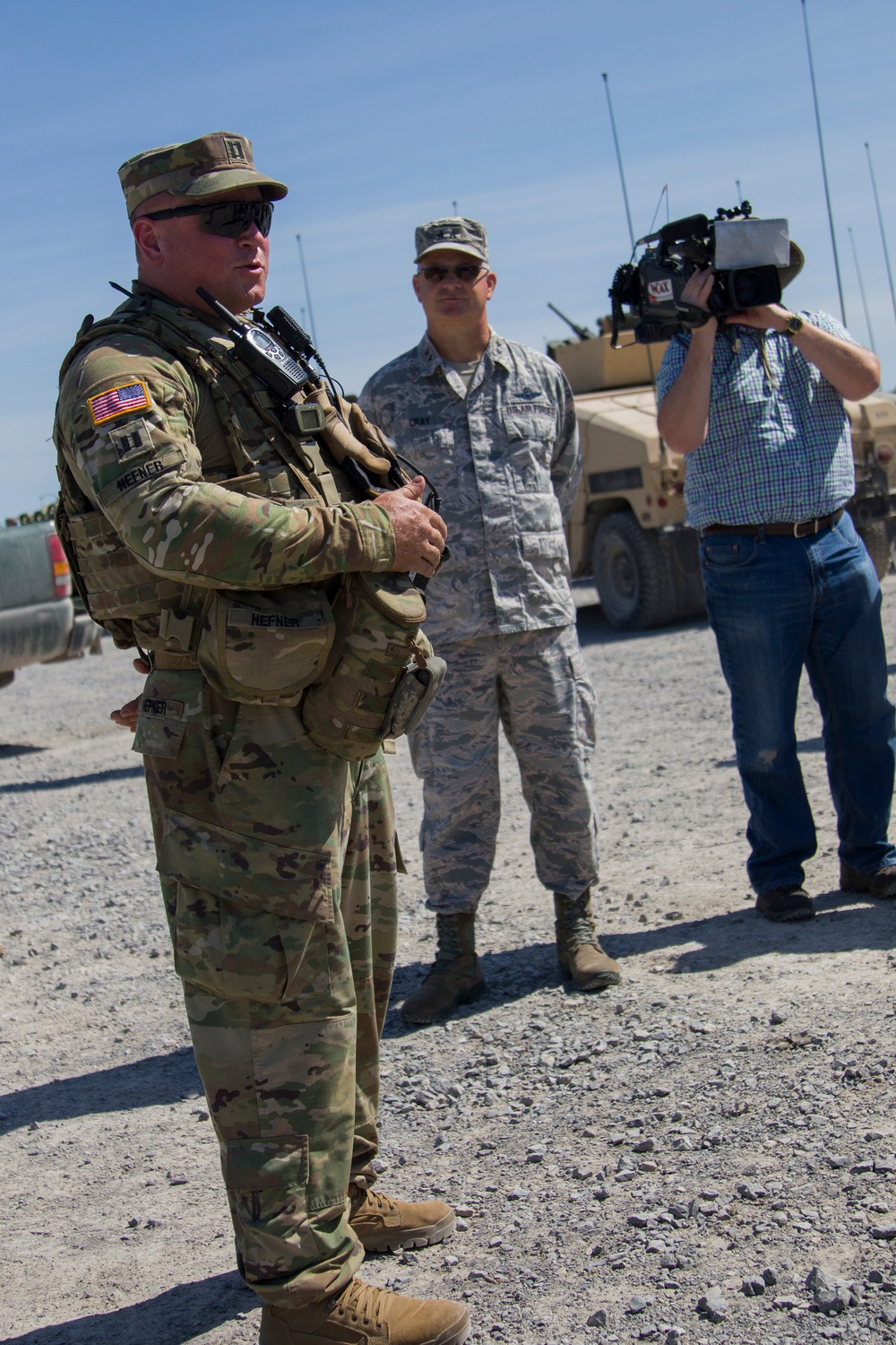 Soldier Speaks with Distinguished Visitors