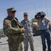 Soldier Speaks with Distinguished Visitors