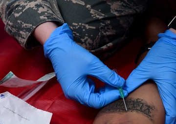 Medical personnel support bomber mission