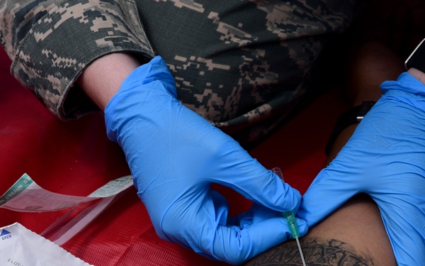 Medical personnel support bomber mission