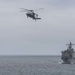America ARG resupplies at sea