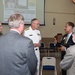 Vice Admiral Forrest Faison Surgeon General and Chief, Bureau of Medicine and Surgery speaks with executives from Point Park University
