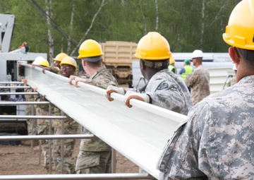 U.S. Army engineers construct a permanent structure for rotational aviation headquarters in Poland