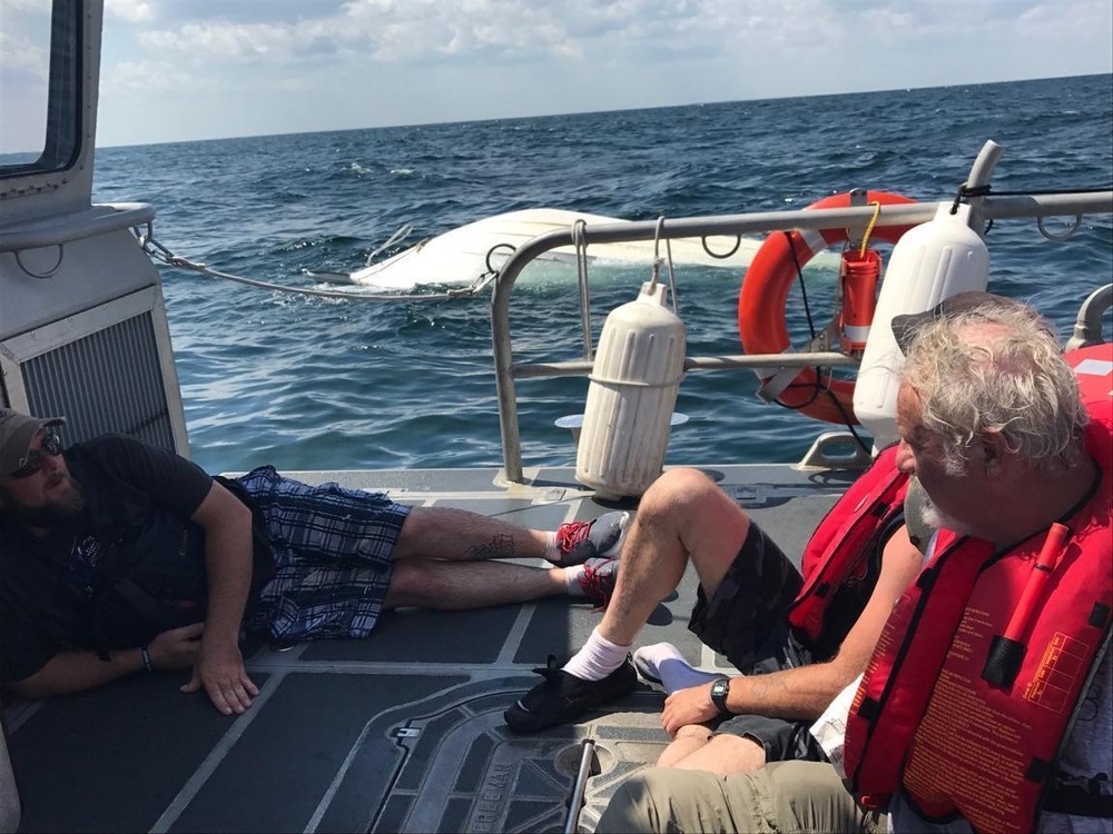Coast Guard rescues 3 from capsized boat near Freeport, Texas
