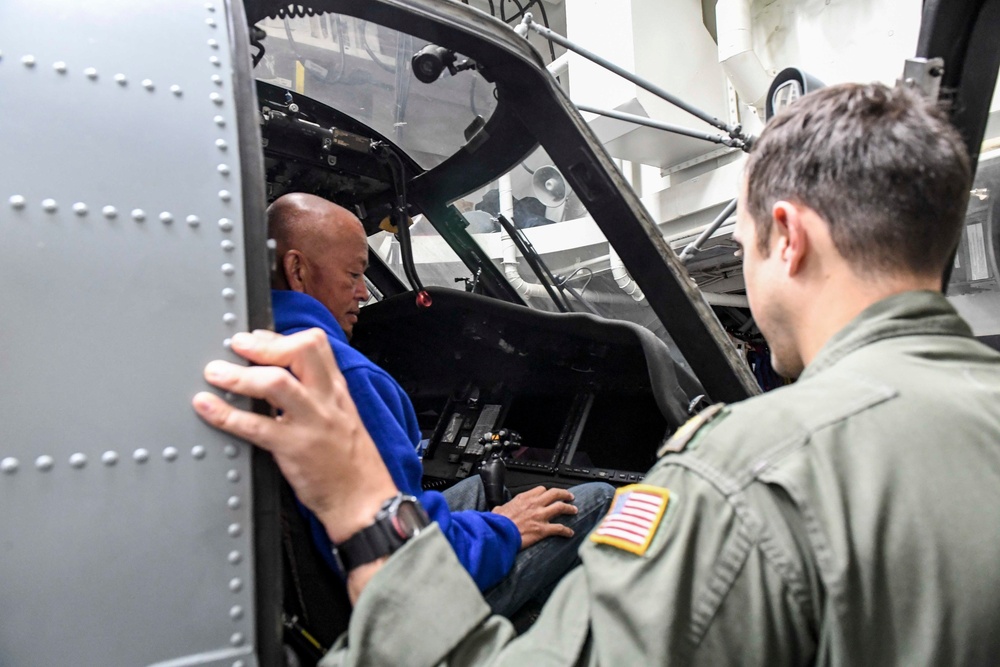 Wayne E. Meyer Gives a Tour of an MH-60R Sea Hawk Helicopter During Tiger Cruise