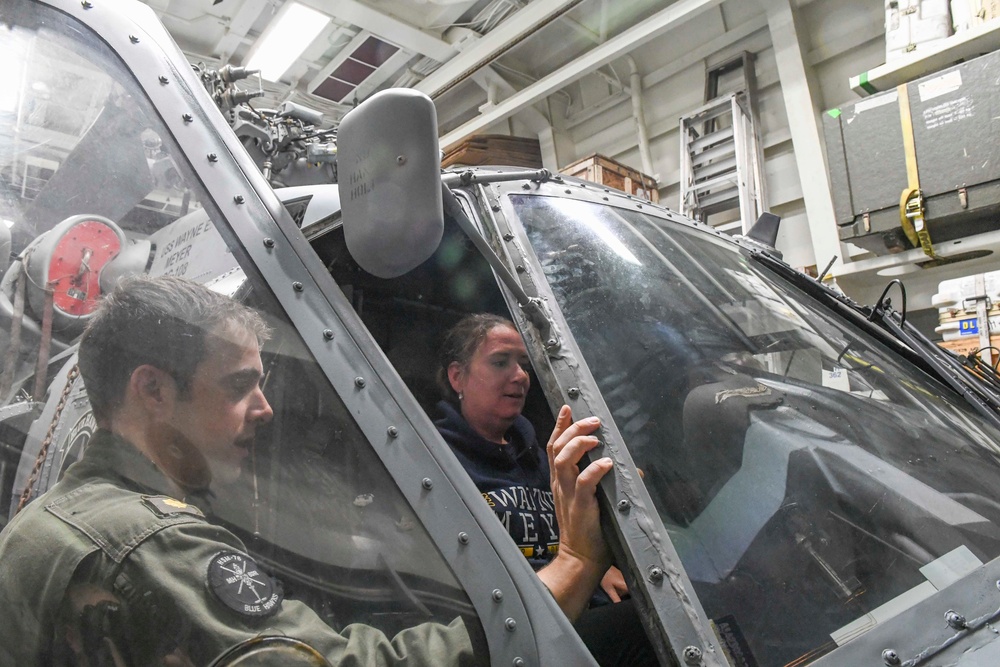 Wayne E. Meyer Gives a Tour of an MH-60R Sea Hawk Helicopter During Tiger Cruise