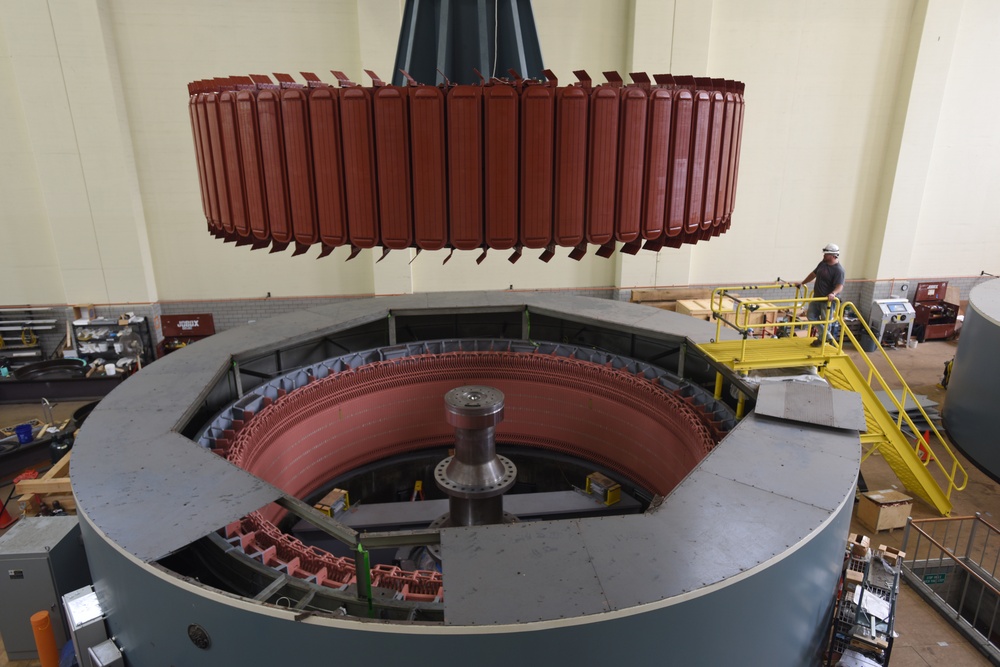 Crew installs 249-ton hydropower rotor at Center Hill Dam