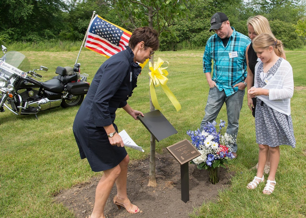 Tree dedication remembers three former employees