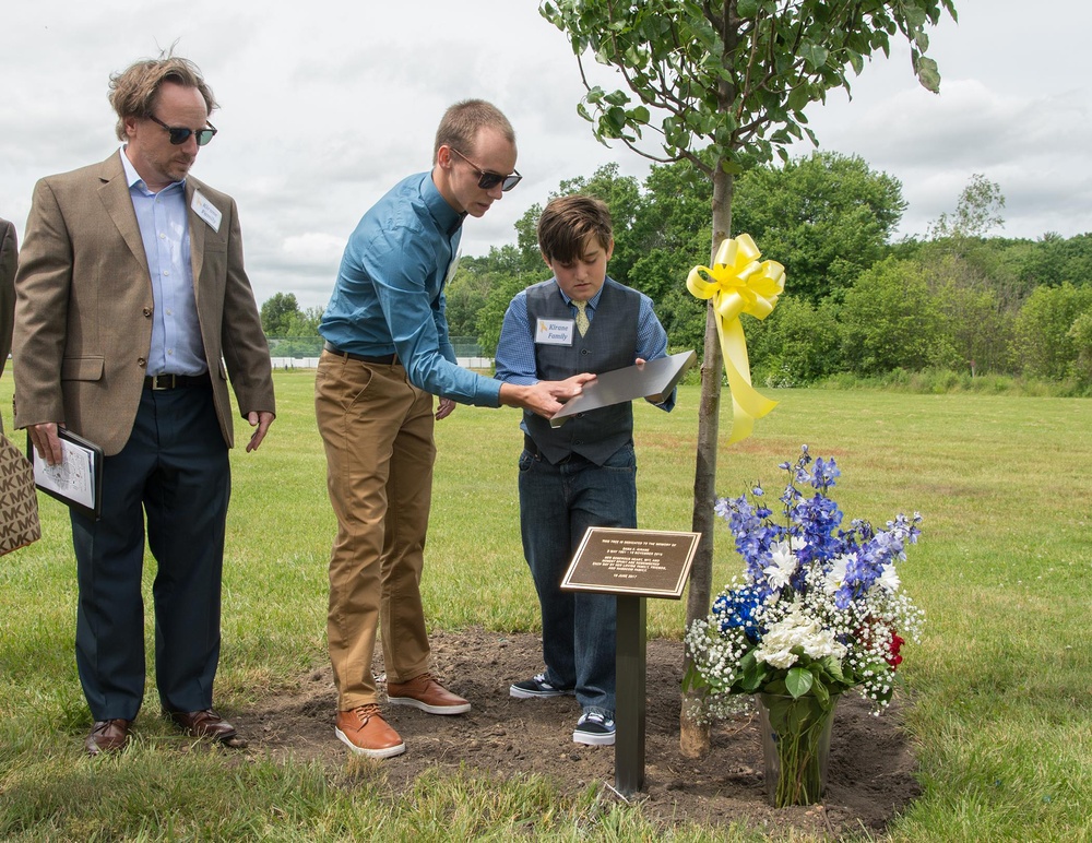 Tree dedication remembers three former employees