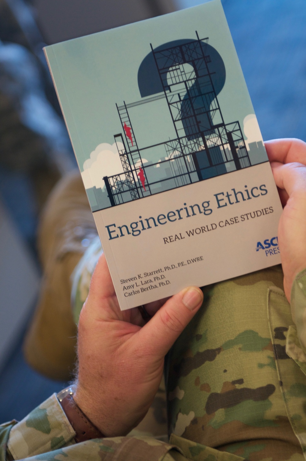 Army Reserve colonel co-authors textbook, influences Air Force cadets