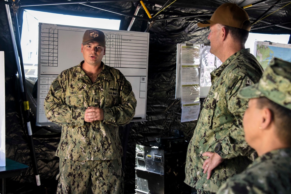The board of directors for Navy Expeditionary Combat Enterprise take a tour
