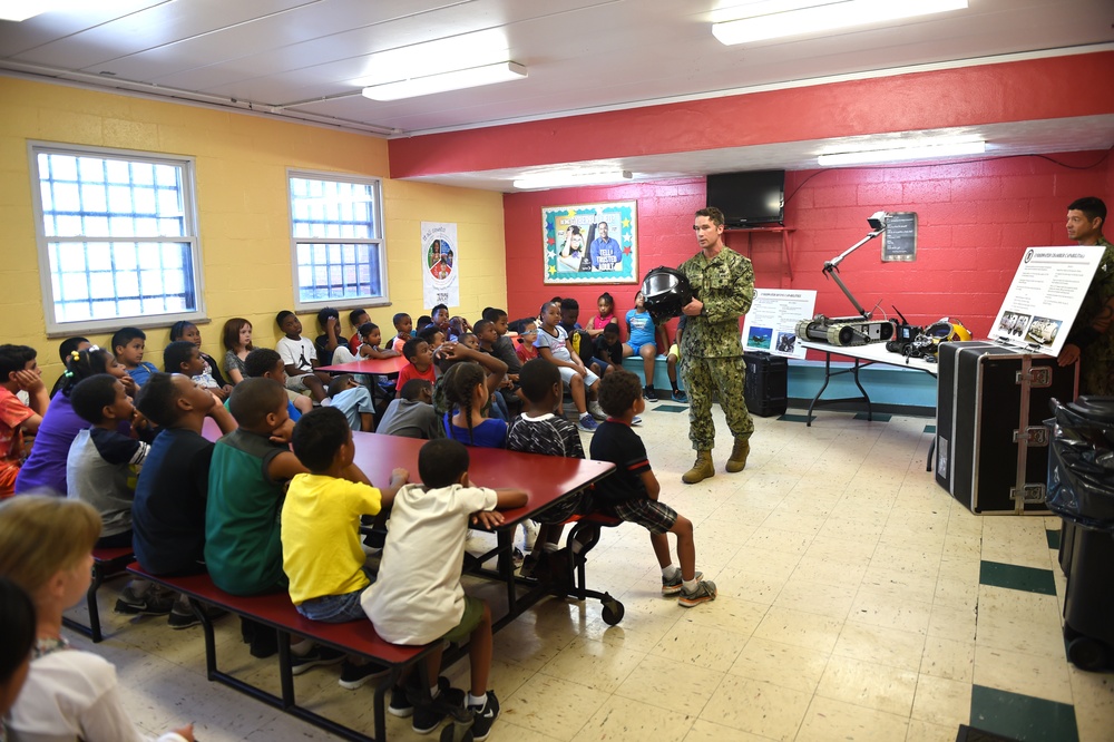 Sailors talk to children at Shadyside Boys and Girl Club