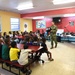 Sailors talk to children at Shadyside Boys and Girl Club