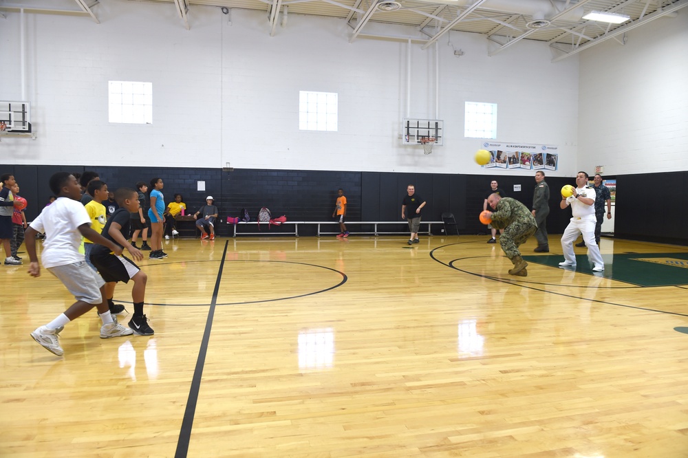 Sailors play dodgeball with the children at Shadyside Boys and Girl Club