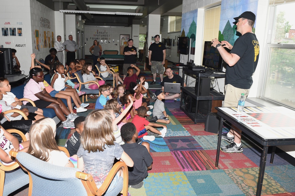 Sailors talk to children at Estelle S. Campbell Boys and Girl Club