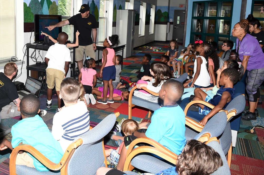 Sailors talk to children Estelle S. Campbell Boys and Girl Club