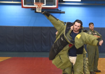 Putting on a bomb suit