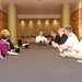 Rear Admiral Jeff Hughes speaks with the executives of Carnegie Mellon University