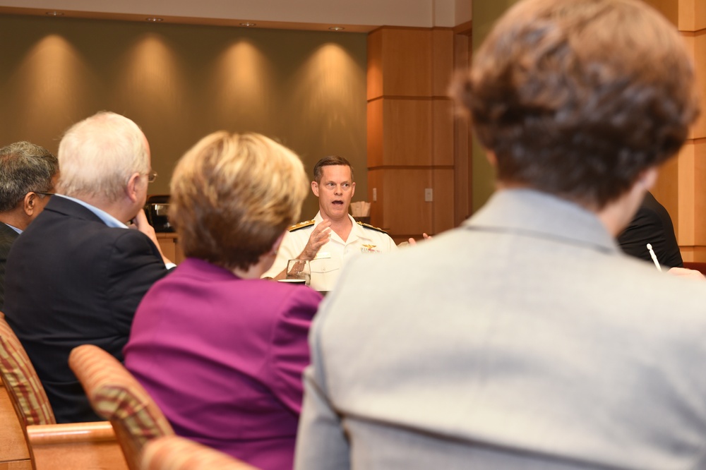 Rear Admiral Jeff Hughes speaks with the executives of Carnegie Mellon University