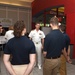 Rear Admiral Jeff Hughes speaks with ROTC Ensign’s