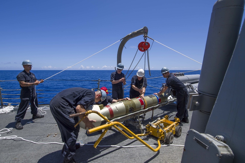 Prepare to move an MK 46 torpedo