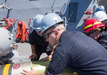 Loading a MK 46 torpedo