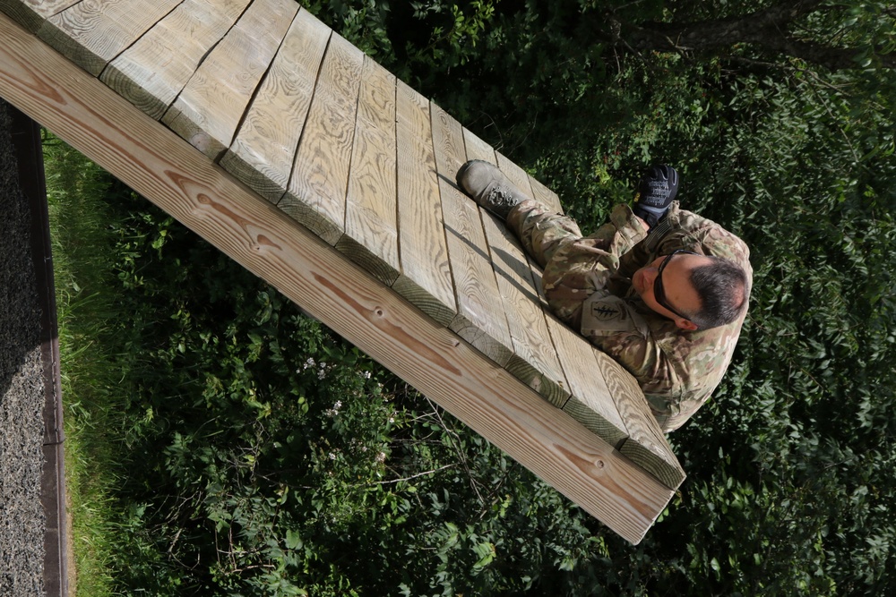 211th EIS commander tackles obstacle