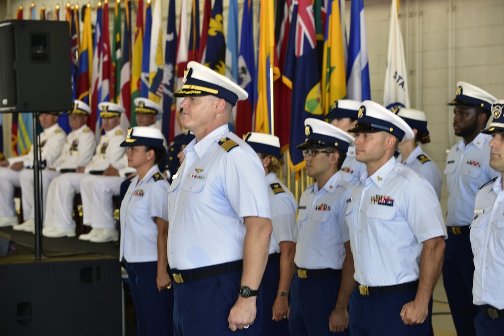 The Coast Guard Seventh District crew stands at attention during their Change of Command Ceremony