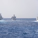 USS Green Bay transits behind USS Bonhomme Richard, USNS Rappahannock and USS Ashland