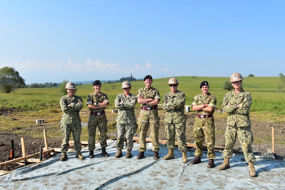 Navy Seabees and U.K. Royal Engineers Pose at RC17