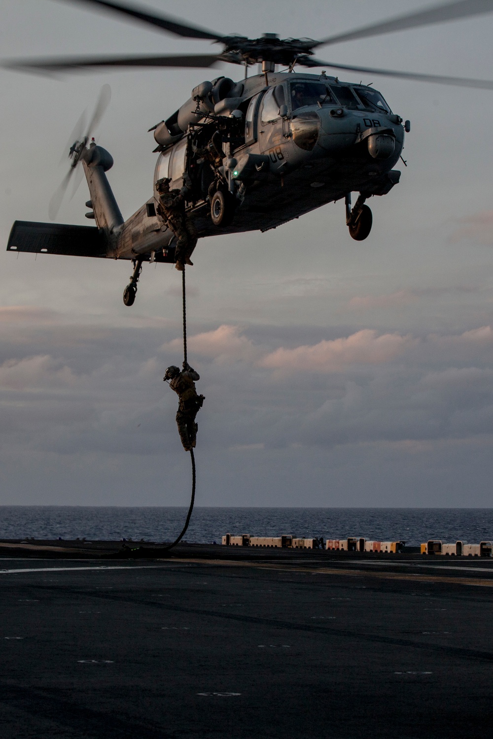 Recon Marines conduct helicopter rope suspension training aboard the BHR