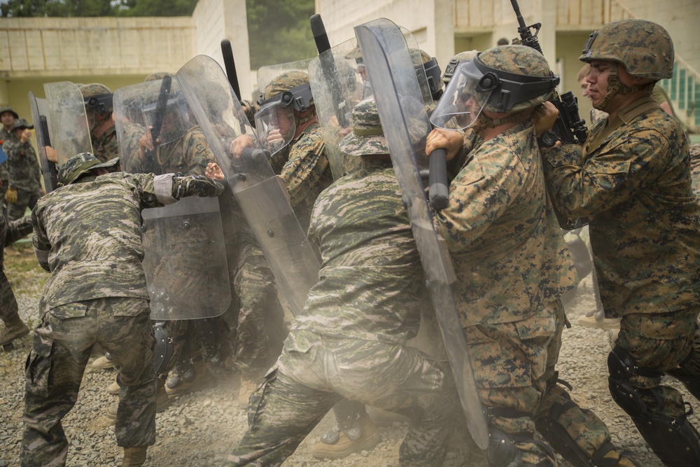 U.S. Marines, Republic of Korea Marines rehearse non-lethal crowd control tactics in South Korea