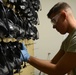 20th LRS Airman hangs masks