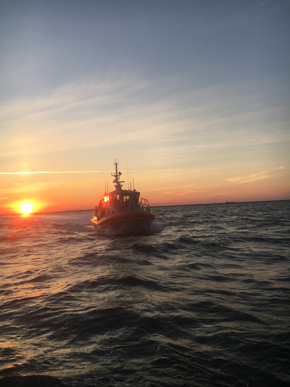 Coast Guard rescues 4 adults, 1 child from water near Masonboro Inlet, NC