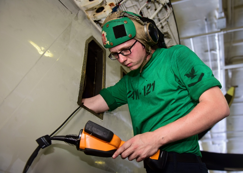 Sailors Clean Aircraft