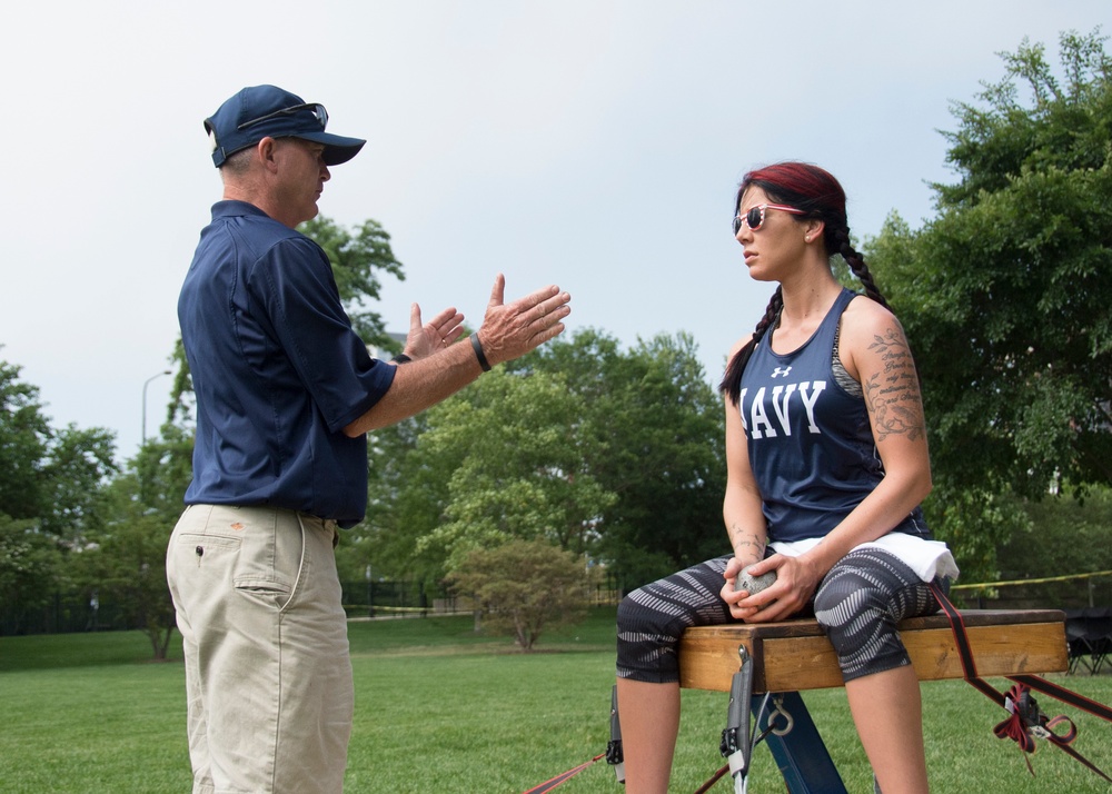 Coach and Athlete Discuss Strategy