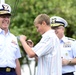 Rear Adm. Todd A. Sokalzuk's son replaces his one-star shoulder boards with two-stars