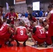 Team Marine Corps athletes participate in sitting volleyball competition