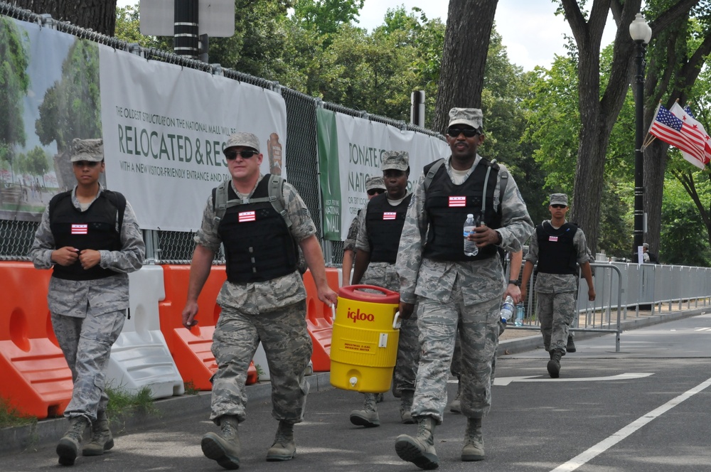 District of Columbia National Guard Airmen move to traffic control points