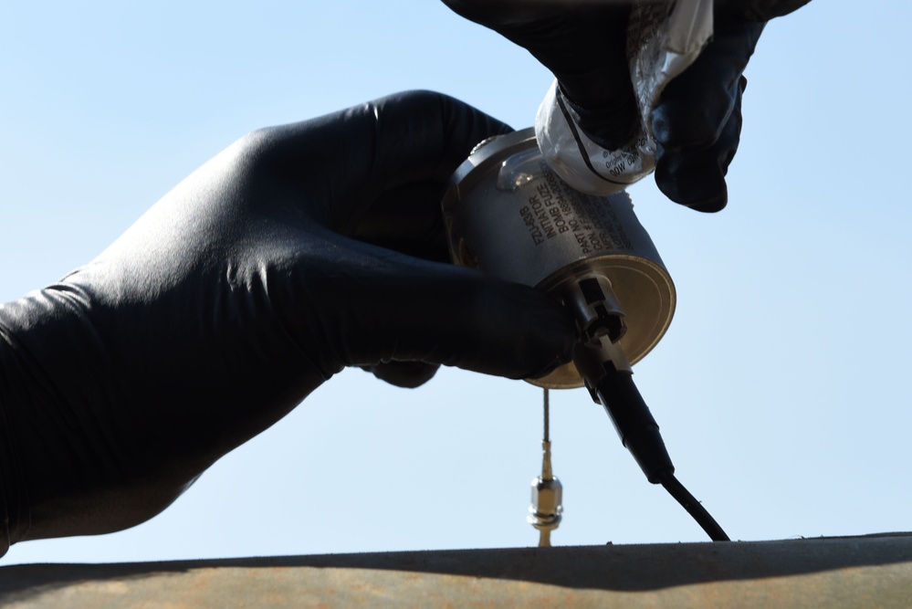 39th ABW commander, 447th EAMXS build bombs