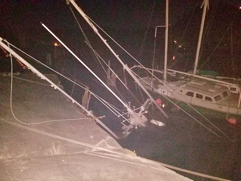 Coast Guard cleans up after fishing vessel Donna sinks at pier