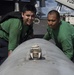 Sailors Attach Fuel Pod Cover