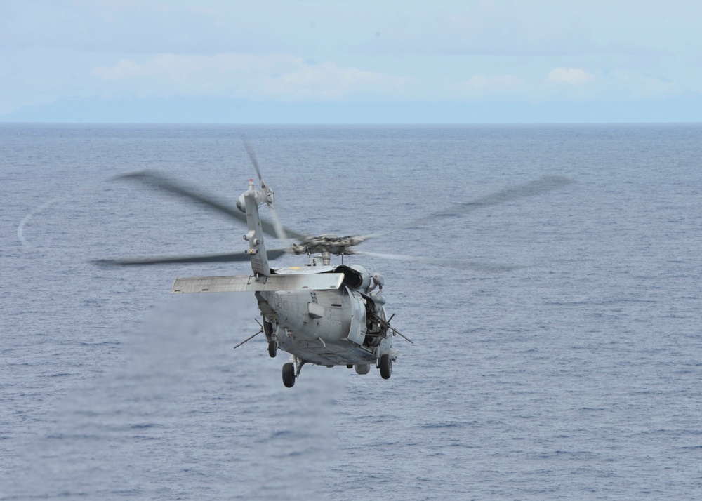 Helicopter Takes Off Of Nimitz