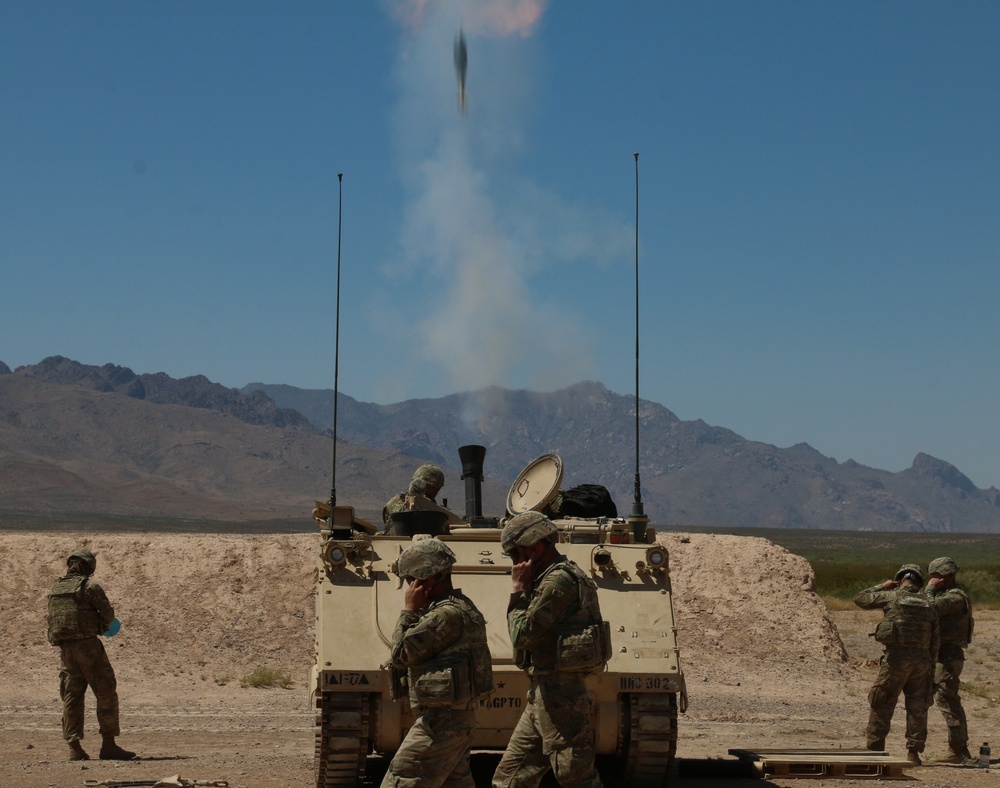 1st Battalion, 77th Armored Regiment, fire 120mm mortars.